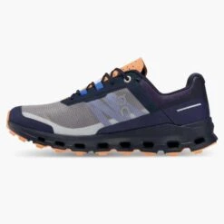 On Running Women's Cloudvista Trail Shoe - Midnight/Copper- Regular (B) -PeakStride Sports Sales 64.98592 cloudvista fw22 midnight copper w g4