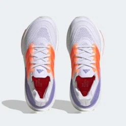ADIDAS Women's Ultraboost Light Running Shoe - Ftwr White/Solar Red/Beam Pink - Regular (B) 12 ADIDAS Women's Ultraboost Light Running Shoe - Ftwr White/Solar Red/Beam Pink - Regular (B) -PeakStride Sports Sales Ultraboost Light Running Shoes White HQ6354 02 standard hover