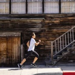 Topo Athletic Women's Ultrafly 4 Running Shoe - Black/White- Regular (B) -PeakStride Sports Sales W056.Black White 10